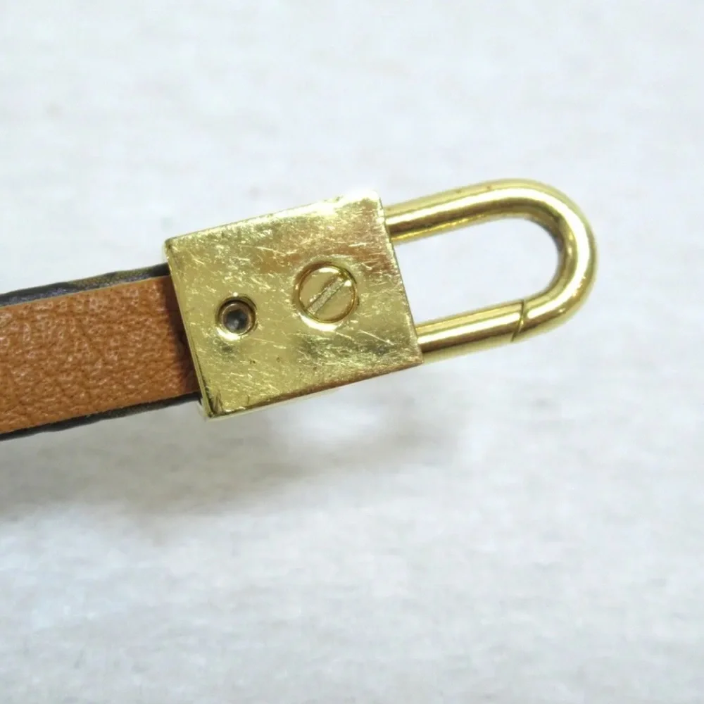 Louis Vuitton luxury bracelet with adorable luggage charm!! - Picture 9 of 11